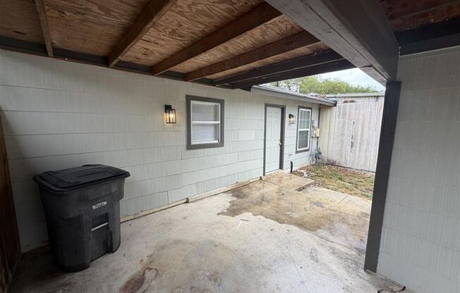 Cute 3/1 home with covered parking and large backyard