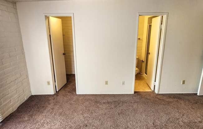 2x2 Upstairs Classic Main Bedroom with Closet and Bathroom at Mission Palms Apartment Homes in Tucson AZ