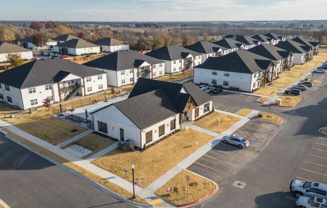 an aerial view of a group of houses in a neighborhood