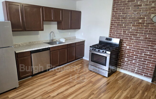 114 W 8 AVE