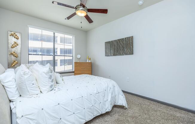 ELEGANT BEDROOM WITH CEILING FAN