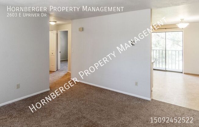 2603 E UPRIVER DR