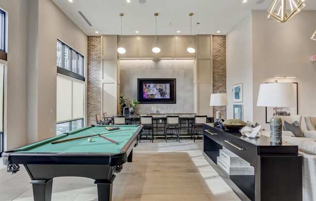 pool table in clubhouse at the estates apartments