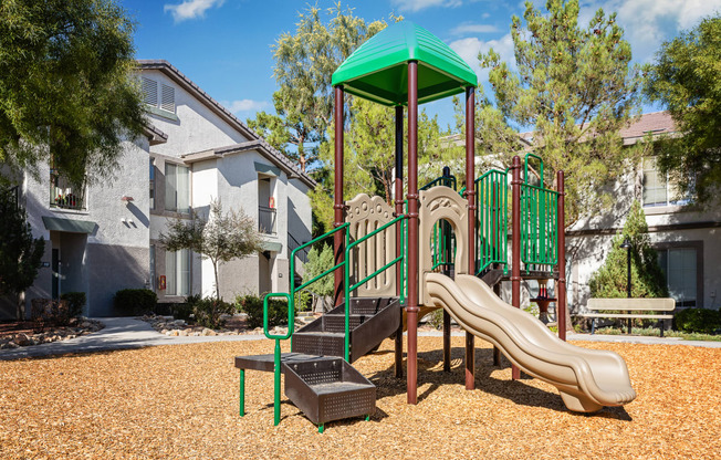 our apartments have a playground with a slide and playset
