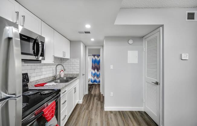 a stainless steel refrigerator in a kitchen