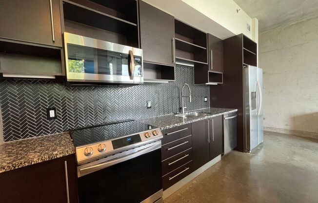 Awesome 1BR Loft Style Condo Overlooking Midtown!
