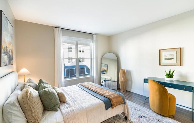 Space for a dedicated desk nook and natural light make this bedroom the perfect mix of rest, focus, or creativity at Modera South Shore.