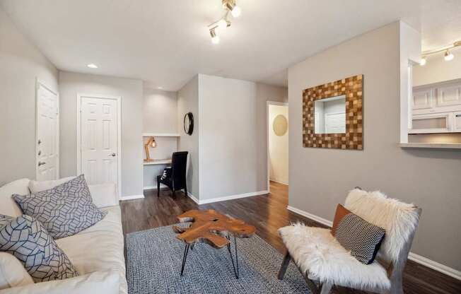 living room with hardwood-inspired flooring at Dakotal Ridge luxury apartments