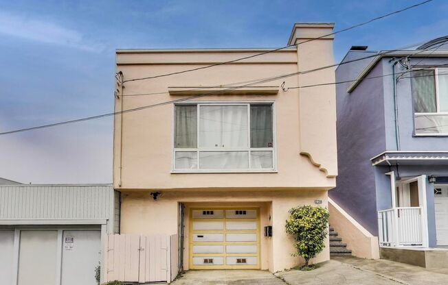 Beautiful Updated 3BD/2BA + Bonus Room Home with Private Yard & Garage