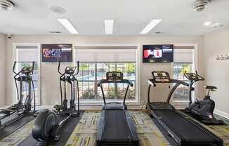 24-hour fitness center with cardio equipment - Evergreen Lenox Park