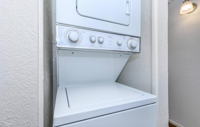 a stove top oven sitting next to a door