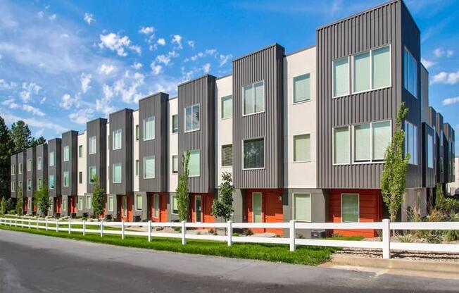 an image of a row of new apartment buildings  at Aero Luxury Townhomes in Layton, Utah
