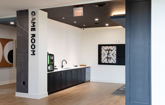 A room with a sign that says Game Room.