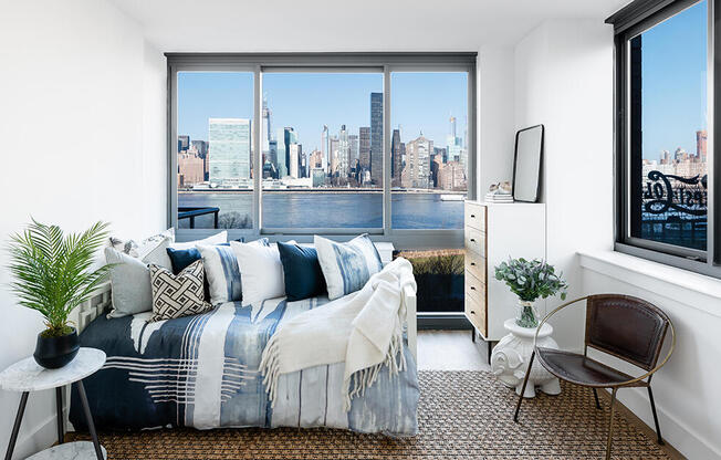 Comfy one bedroom rentals with large windows overlooking the waterfront in Long Island City, Queens.