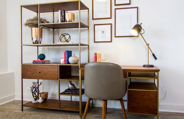 Decorated desk with chair at The Graham at Southern Towers, Alexandria