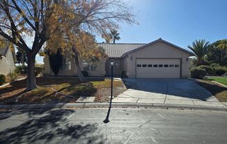 GUARD GATED SINGLE STORY HOME WITH FENCED IN YARD