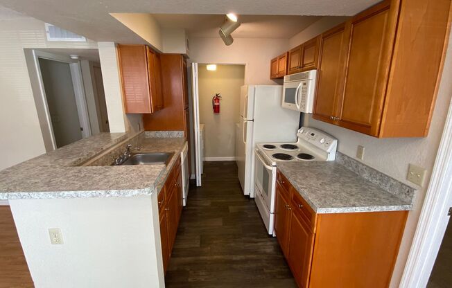 2br/2ba Tradewinds Condo with Wood Floors & W/D!