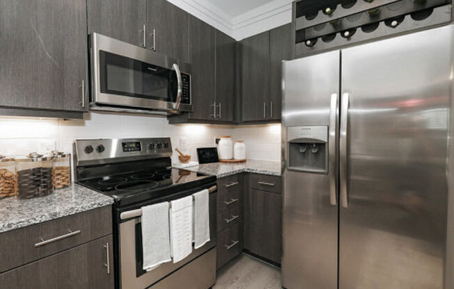 Interior-Kitchen at Cue Luxury Apartments, Cypress, TX