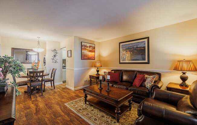 a living room with couches and a coffee table