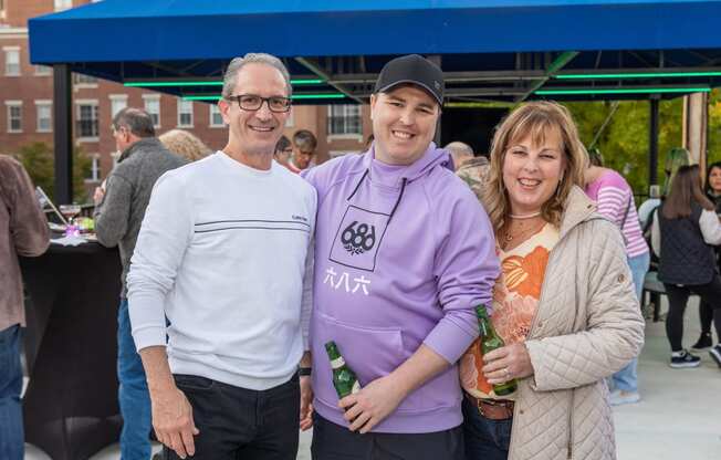 a group of people posing for a picture at an event