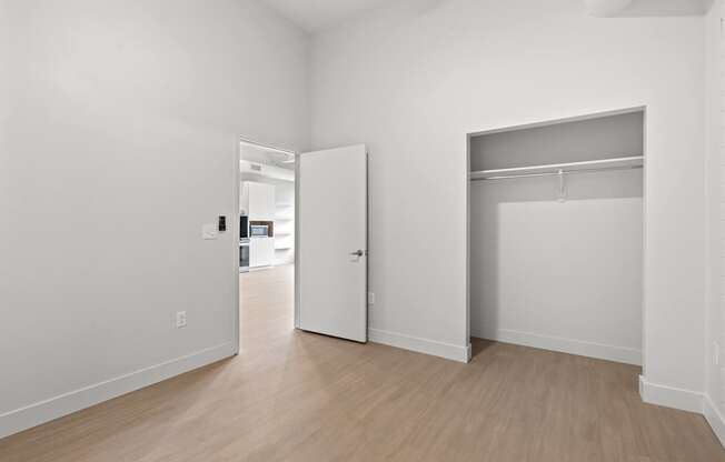 A white room with a door and a window. at Brickside Heights, Utah, 84106
