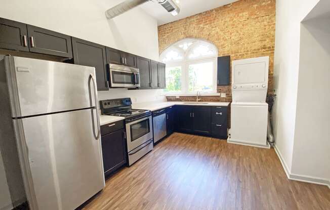Upgraded Kitchen with Stainless Steel Appliances and Hardwood Flooring at University Commons at McKee Place, 15213