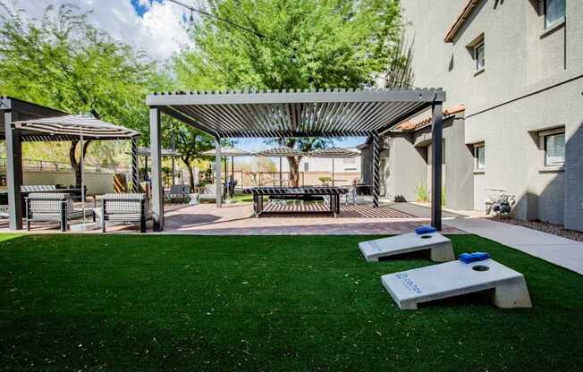Colton Apartments A patio space with a pavilion and benches.