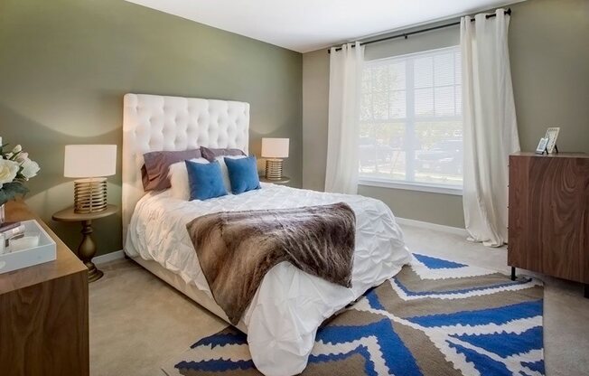 Bedroom With Expansive Windows at The Waverly at Neptune, New Jersey