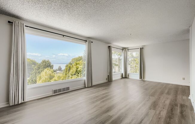 Recently Updated 3 Bed 2 Bath Seattle Home w/ Attached Garage!