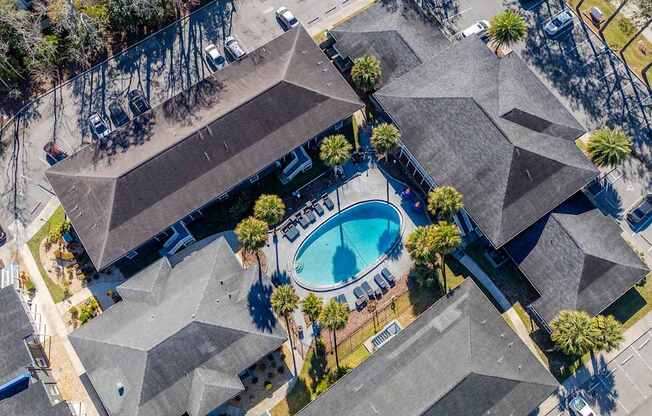 A bird's eye view of Mandarin Bay Apartments with a swimming pool.