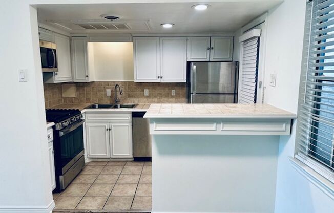 2 beds, 1.5 baths, 957 sqft, $1,675, Unit 105