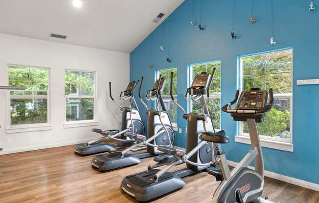 the gym with cardio equipment at the colony house apartments