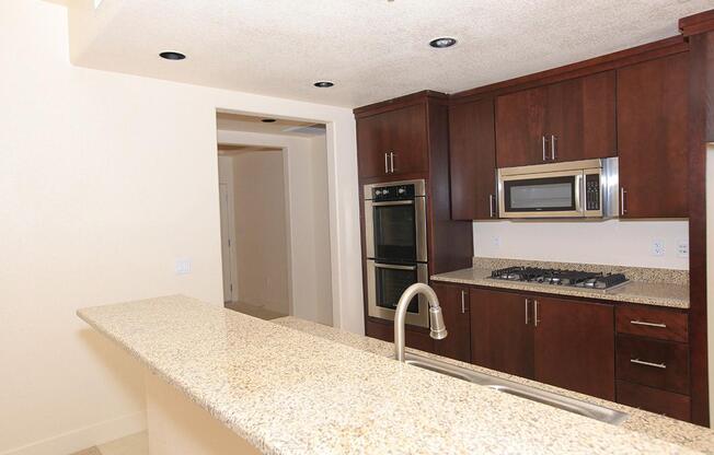 ECHELON AT CENTENNIAL HILLS IN LAS VEGAS HAS GRANITE COUNTERTOPS AND STAINLESS STEEL APPLIANCES