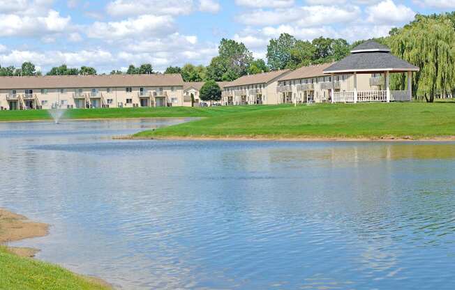 A large building with a fountain in front of it.