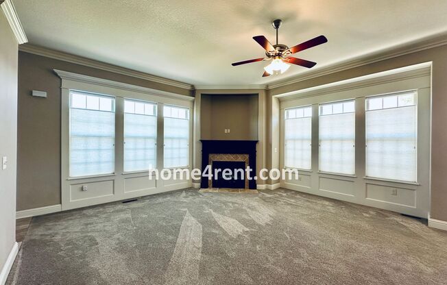 Main Level Primary Bedroom, Updated Kitchen, Wood Floors and a Finished Basement!