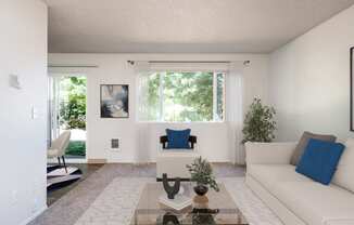 a living room with a white couch and a coffee table