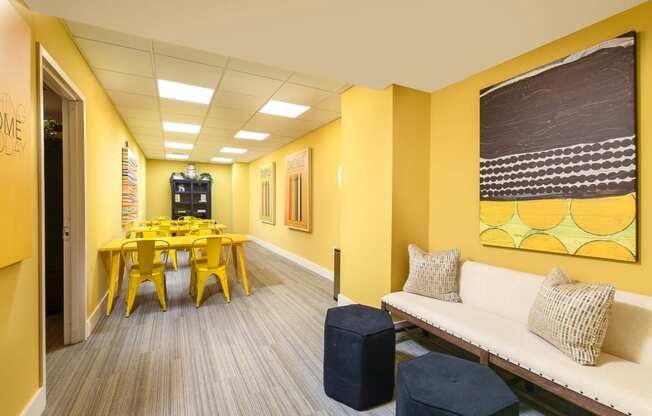 a dining room with a table and a couch