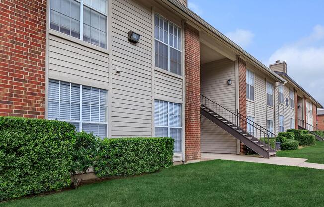 community building with green grass