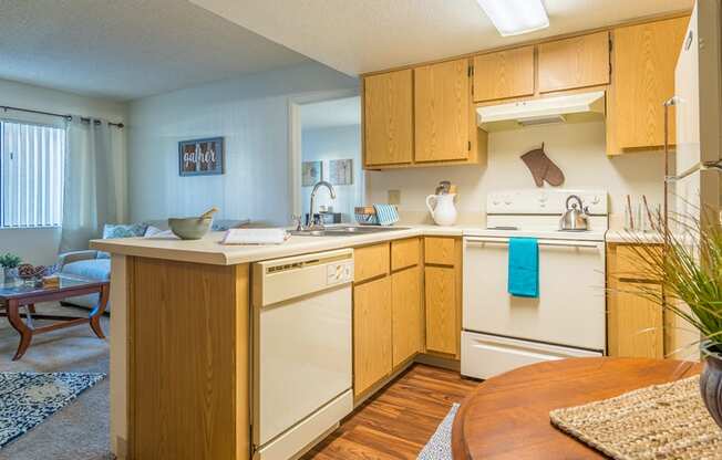 Canyon creek spacious kitchen with plenty of cabinetry, a fridge, and a stove