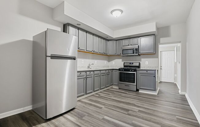 Spacious 4-Bedroom, 1-Bathroom home with Modern Amenities in Downtown Baltimore
