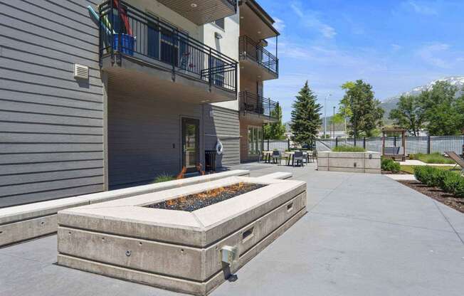 the courtyard at the whispering winds apartments in pearland, tx at The Flats at Riverwoods, Utah