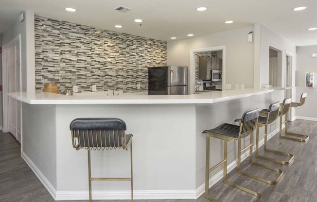 European-Style Kitchen With Breakfast Bar at Bella Vista Apartments