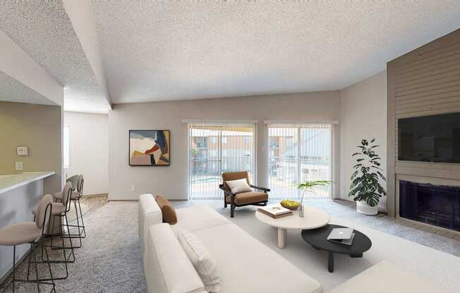 A living room with a white couch, a coffee table, and a fireplace.