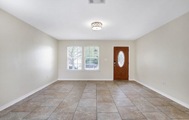 Two-Story Retreat with Modern Amenities and Convenient Access