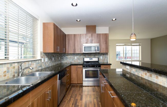 2BD 2.5BA + Office + Tri Level Townhouse w/Garage + AC + Balcony + Washer/Dryer Included
