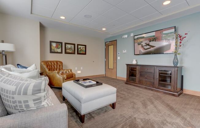 Living room with TV at The Legends at Silver Lake Village 55+ Apartments, St. Anthony, 55421