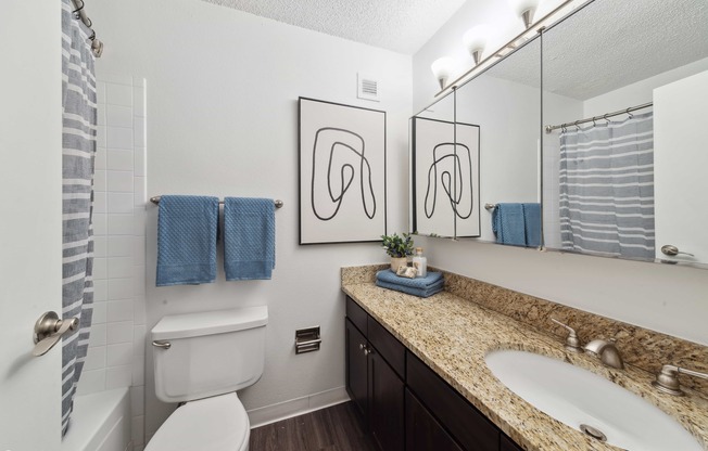 the preserve at ballantyne commons apartments bathroom with two sinks and mirrors