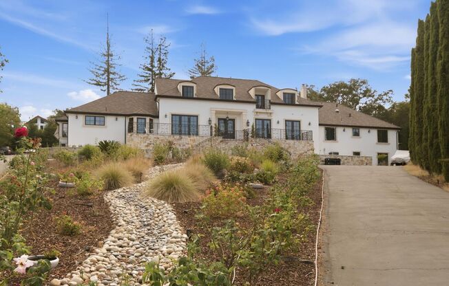 Experience Refined Living in this Expansive 6 Bed, 4.5 Bath Monte Sereno Home.
