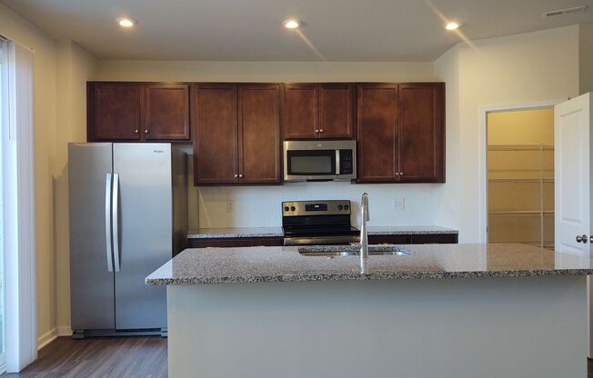 Move-in ready Townhome located in the Pergola at Farmington Community!
