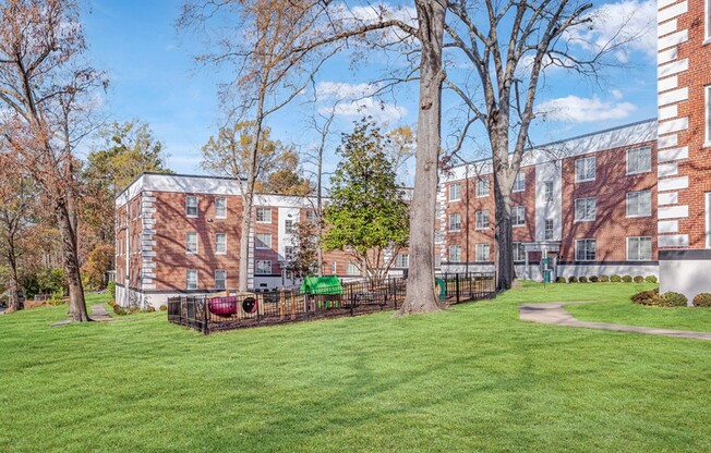 Step into the vibrant outdoor space at Icon Downtown Durham, where lush greenery meets modern living. Enjoy serene pathways and inviting areas perfect for relaxation or play. Explore your new community today!